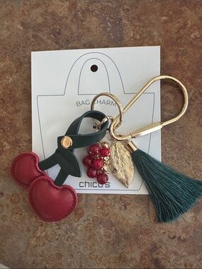 Chico's Red Cherry & Green Tassel Keychain with Gold Leaf